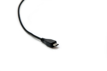 Black USB mini cable on white background. Connector close-up.
