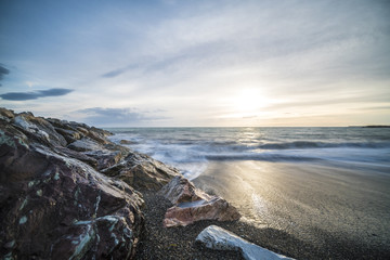 Beautiful sunset over the Sea in Tuscany in Italy (long exposure)