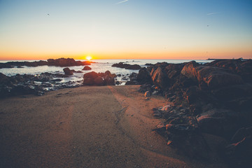 An amazing sunset on the coast at the ocean