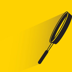 frying pan drop shadow on yellow background