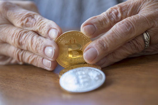 Hands Holding Bitcoin ,Electronic - Digital Money
