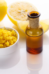 Lemon essential oil on a white background