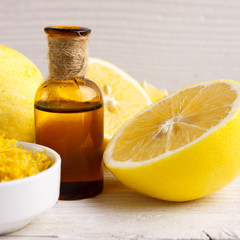 Lemon essential oil on a white background