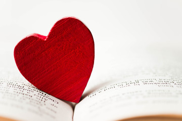 Red heart on the book. Concept : Valentines day, love, love reading