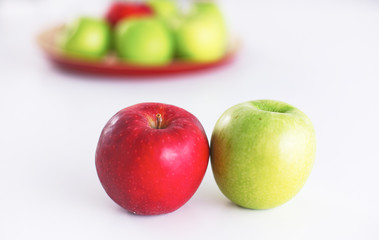 Apples green and red in the foreground
