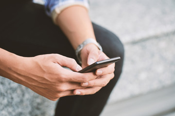 Male Hands Using Smartphone