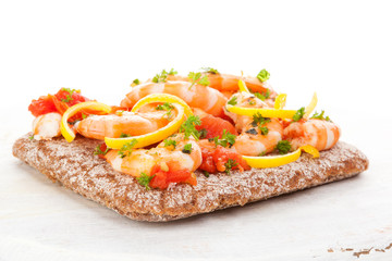 Shrimps on healthy bread.