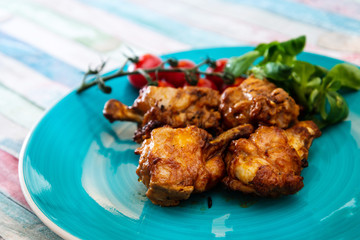 roasted sleeves chicken with potatoes and barbecue sauce