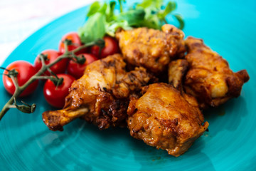 roasted sleeves chicken with potatoes and barbecue sauce