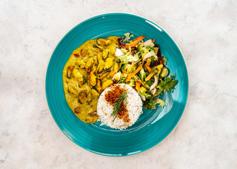 Mussels with curry sauce Rice and salad