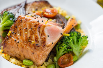 Grilled Salmon Fillets with Vegetables on White Plate