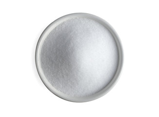 Bowl of sugar isolated on white background, top view