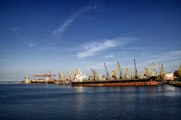 Cargo harbour, cargo ship in harbour, Loading process of cargo ship