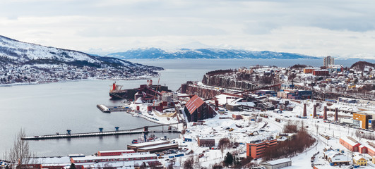 Panorama Norway Narvik, view of the city and the bay, with one ship being loaded up at the iron ore plant, a winter day - 203545427