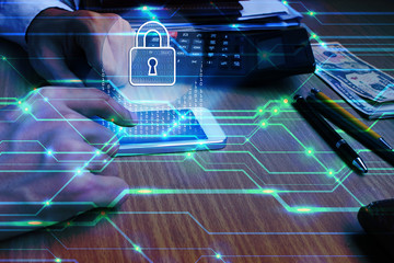 Businessman hand use smartphone with padlock