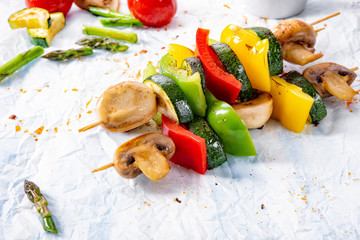 vegetarian skewers white mushrooms, peppers and zucchini for barbecue