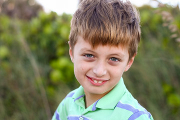 Young Boy On Beach Dunes