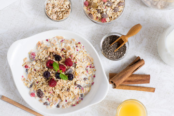 Muesli With Milk, Chia Seeds, Berries and Cinnamon with Freshly Squeezed Orange Juice