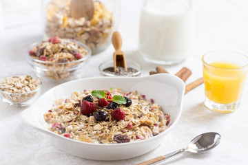 Muesli With Milk, Chia Seeds, Berries and Cinnamon with Freshly Squeezed Orange Juice
