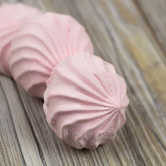 berry zephyr on a wooden background