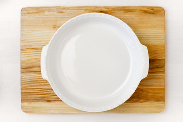 Empty white round baking pan