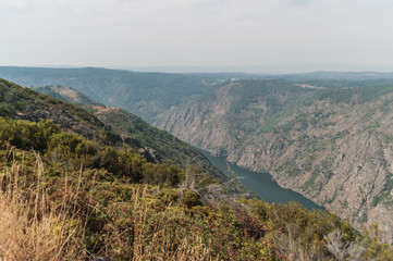 View of the Sil river canyon (ribeira sacra) from the viewpoint of the balconies of Madrid in Parada do Sil, Ourense (Spain). 