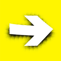 White arrow sign on yellow background.