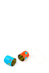 Colourful hand painted can telephone on white background.