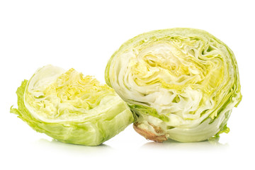 Obraz premium Sliced iceberg lettuce one section half and a quarter isolated on white background.