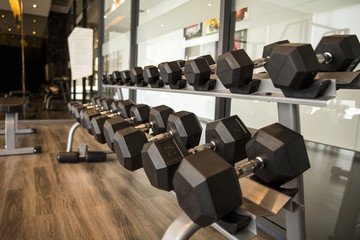 Sports dumbbells in modern sports club for a exercise in the fitness center in gym,Weight Training Equipment