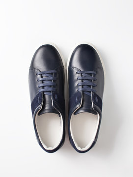 Pair of men's shoes on white background