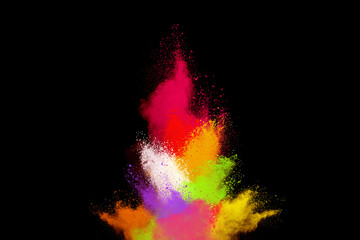 Launched colorful powder, isolated on black background