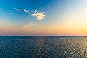 Beautiful clouds over the sea. On the Sunset. Warm light.