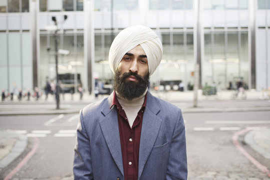 Portrait of a Sikh businessman in a city street