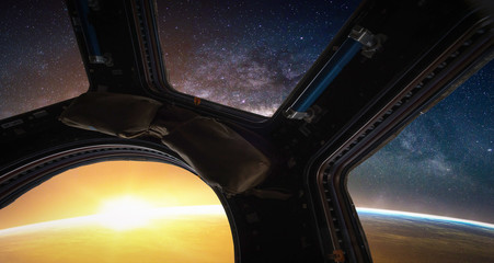 Landscape with Milky way galaxy. Sunrise, Earth and Spacecraft view from space with Milky way galaxy. (Elements of this image furnished by NASA)