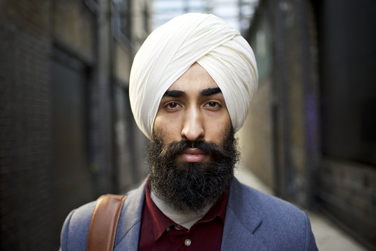 Portrait of a Sikh businessman in a city street