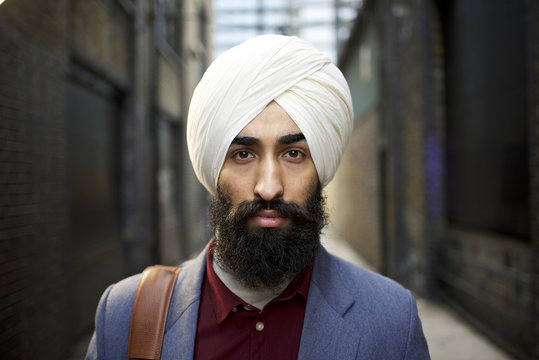 Portrait of a Sikh businessman in a city street