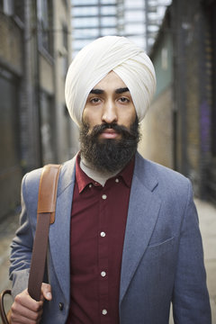 Portrait of a Sikh businessman in a city street
