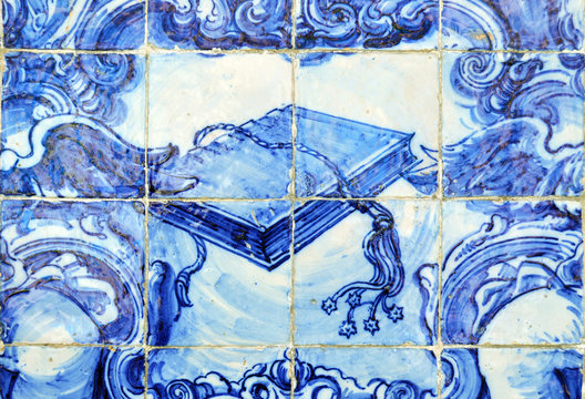 Book and whip with spikes for penance, Portuguese tiles