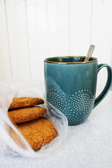 
cup of cocoa with biscuits