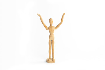 A wood figure model in worship God action.