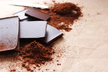 pieces of chocolate and cocoa. black chocolate.