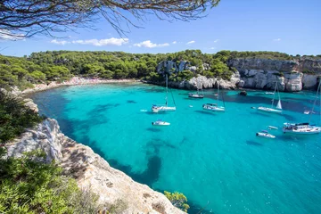 Poster Meer / Ozean Boats and yachts on Macarella beach, Menorca, Spain
