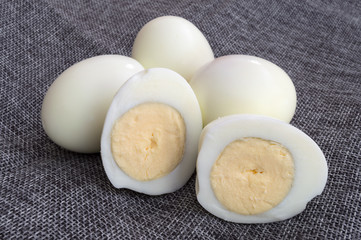 group of hard-boiled eggs without shells and cut in half