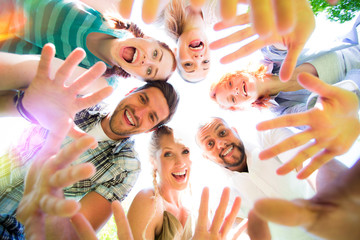 Group of cheerful school friends taking a selfie - obrazy, fototapety, plakaty