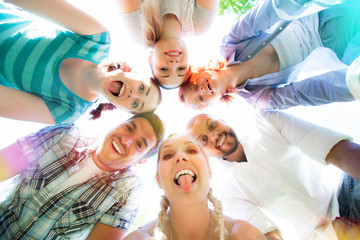 Group of cheerful school friends taking a selfie