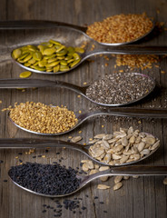 Spoons with assortment of seeds