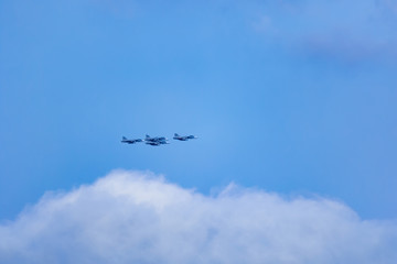 Jet fighters on a Summer day over the clouds