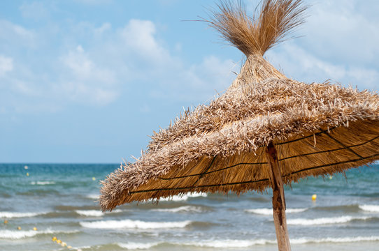 beach umbrella made of straw