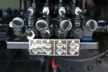 Fototapeta premium Levers on the control panel of the lifting mechanism.